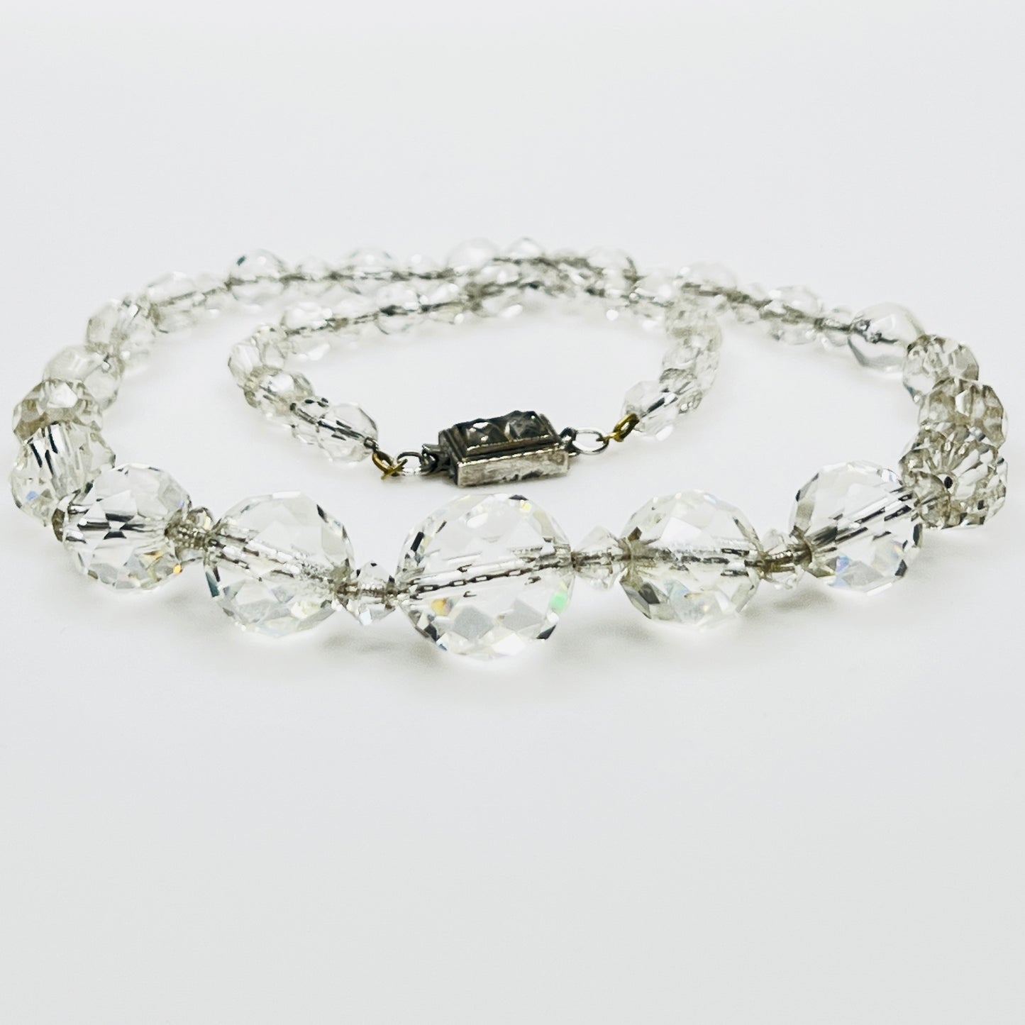 Close view of faceted crystal beads with bicone spacers