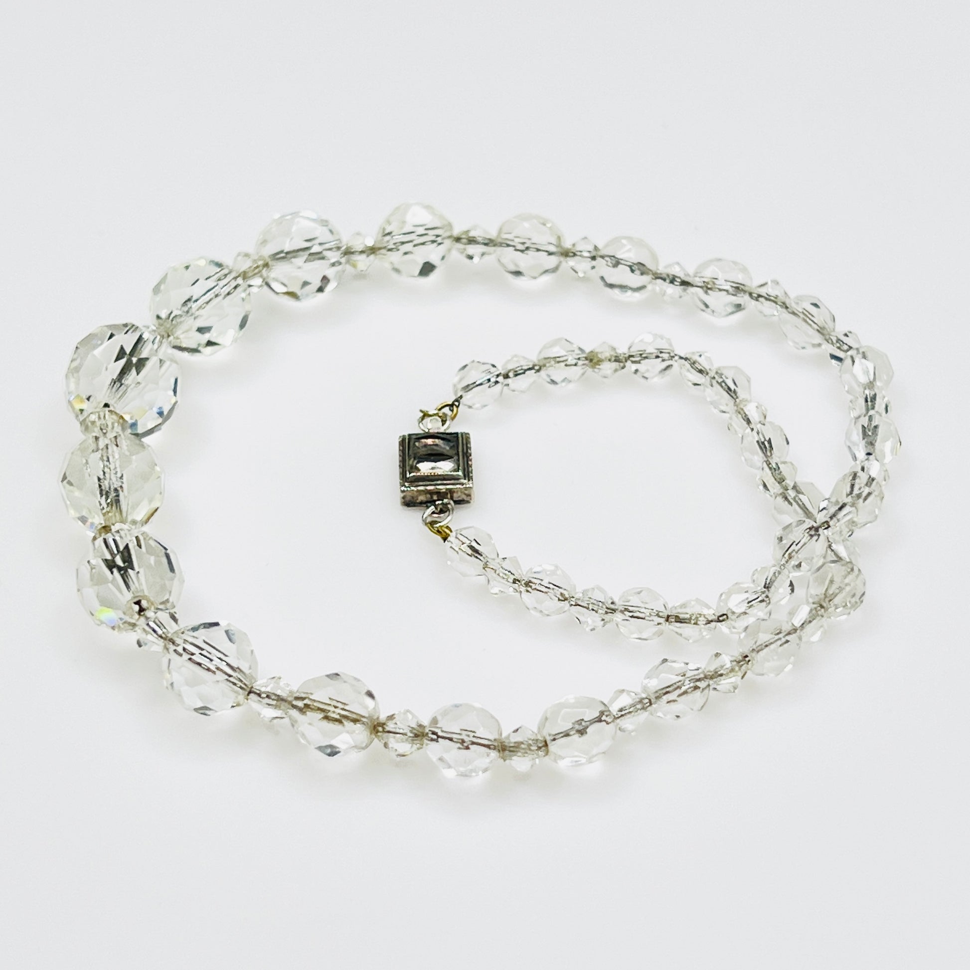 Close view of faceted crystal beads with bicone spacers