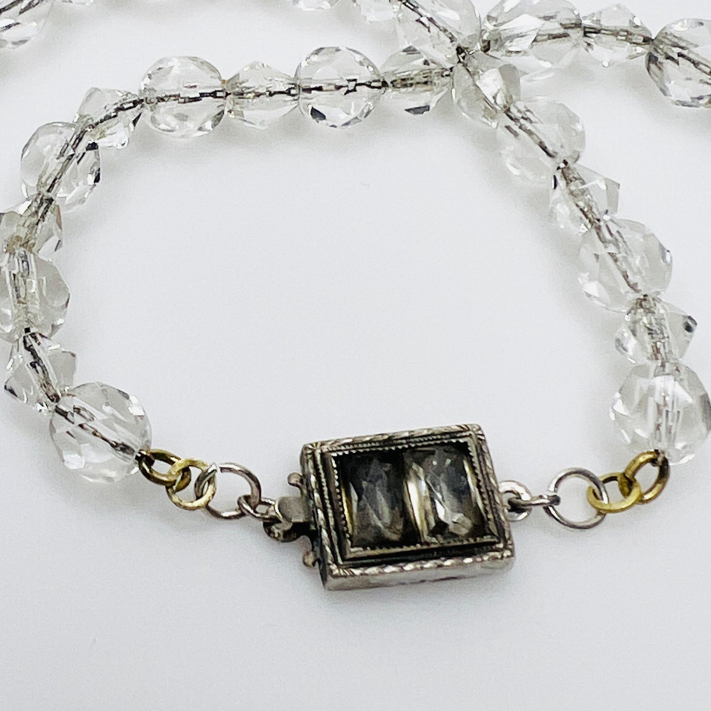 Sterling silver clasp on vintage crystal bead necklace