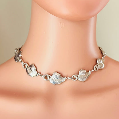 Silver leaf choker worn on mannequin mid century style