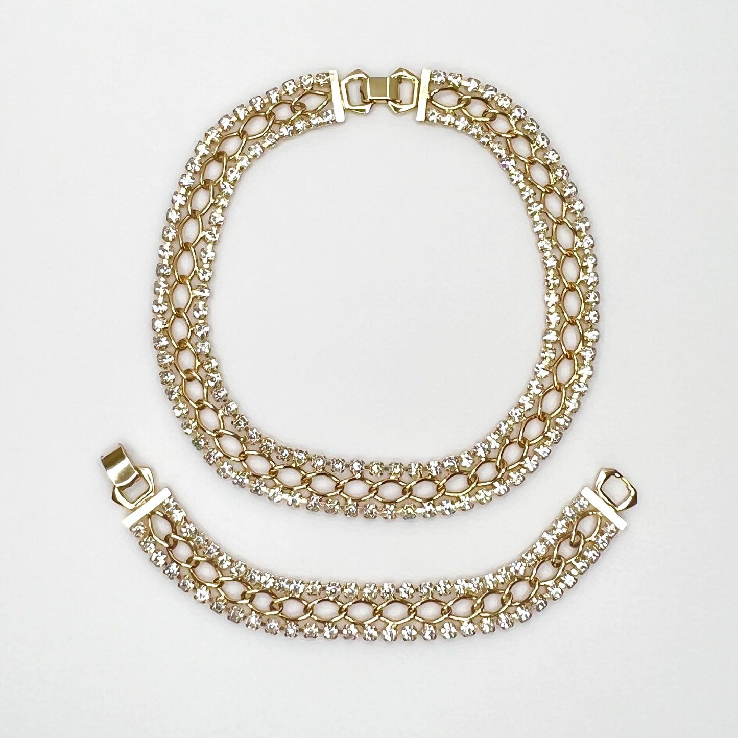 Vintage gold tone rhinestone choker necklace and bracelet set with prong-set clear crystals