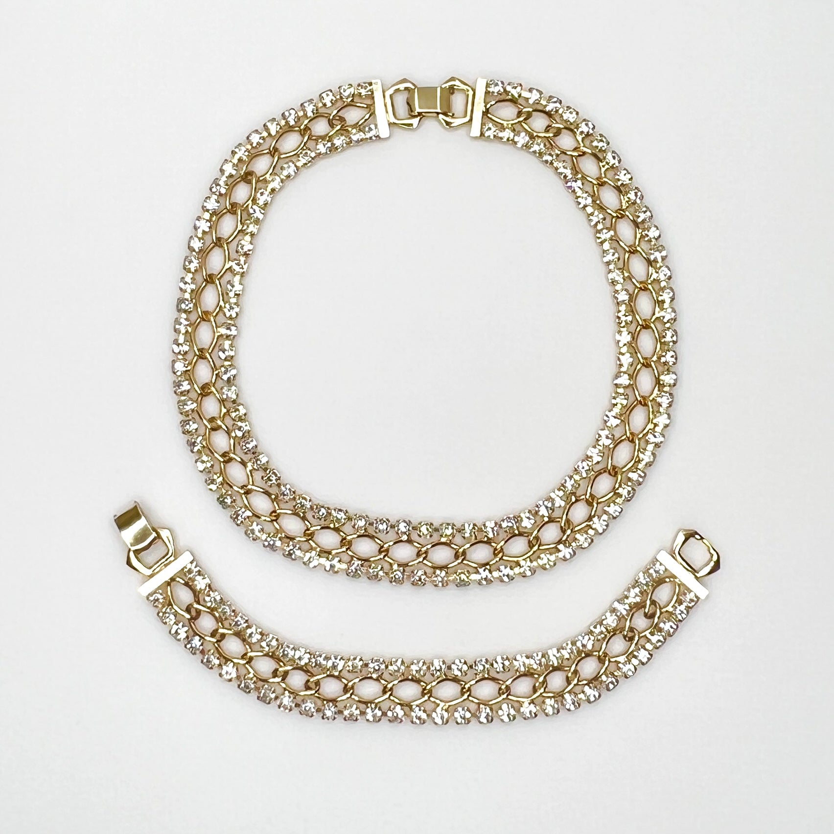 Vintage gold tone rhinestone choker necklace and bracelet set with prong-set clear crystals