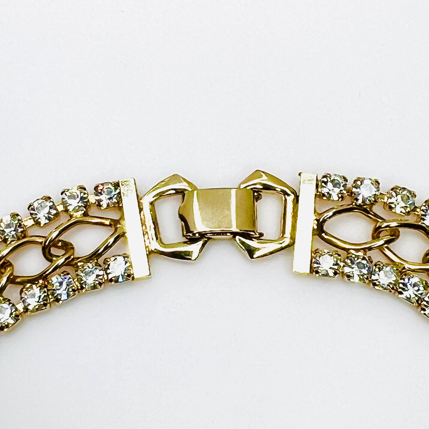 Fold-over clasp detail on vintage rhinestone choker necklace
