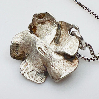 Reverse of vintage Madonna pendant showing Italy hallmark