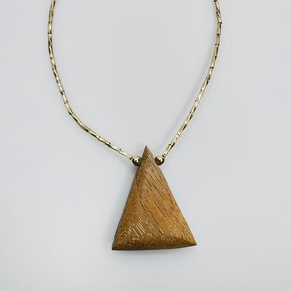 Back of pendant wood triangle artisan necklace