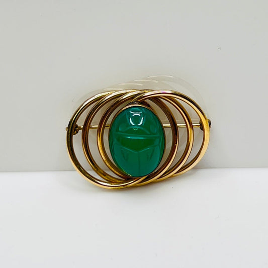 1950s gold-filled scarab brooch with green carved glass