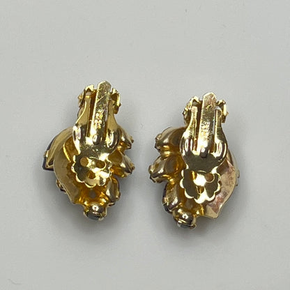 Vintage black rhinestone and gold-tone leaf brooch with matching clip-on earrings