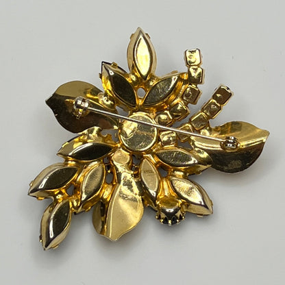 1950s vintage jewelry set with prong-set black stones and sculpted floral design