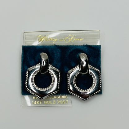 Pair of silver door knocker earrings on original Whiting & Davis card