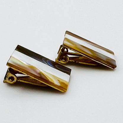 Side view showing clip-on mechanism and shell inlay