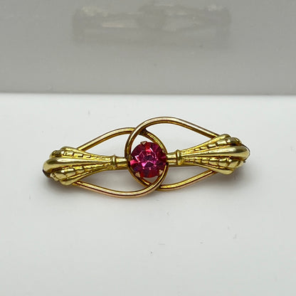 AMCO Art Nouveau bar brooch with pink rhinestone and 10K gold fill