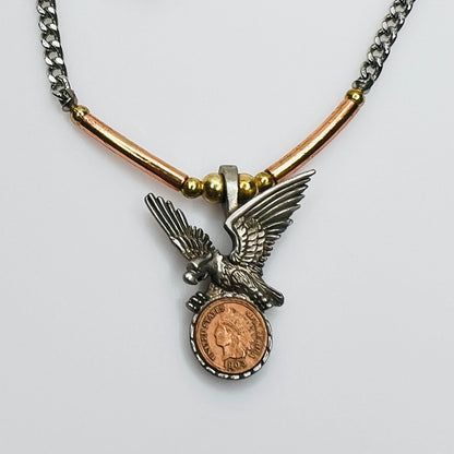 Mixed metal eagle pendant necklace with coin medallion detail