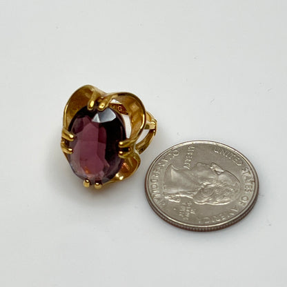 Purple crystal statement ring in yellow gold-tone floral setting