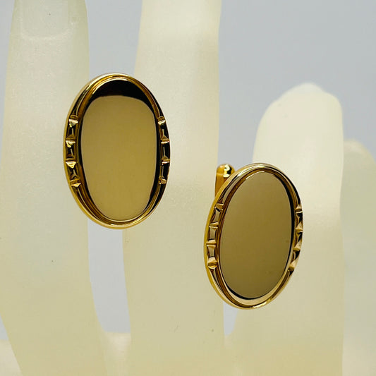Vintage Anson gold-tone oval cufflinks with faceted edge detail