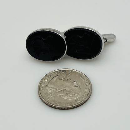 Sterling silver cufflinks with black Roman centurion intaglios, front view