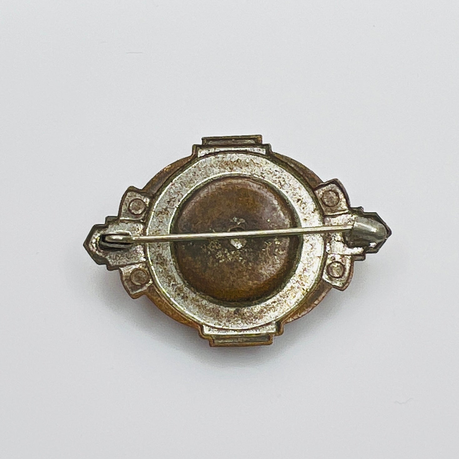 Reverse of antique Victorian brooch showing original C-clasp closure