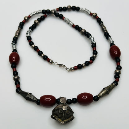 Vintage ethnic-inspired red ceramic and black glass bead necklace with matching earrings and silver-tone pendant