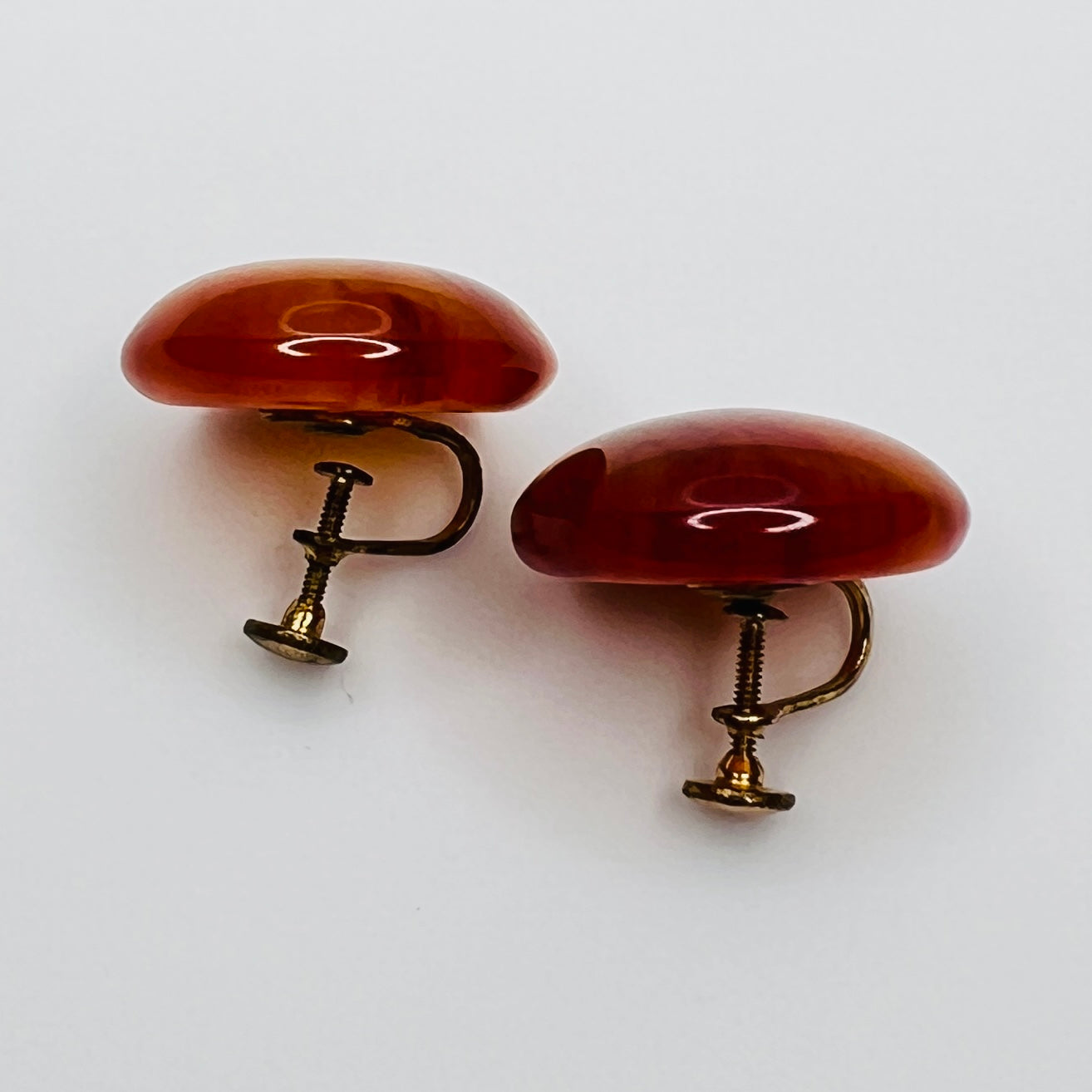 Amber and caramel marbled Bakelite round earrings
