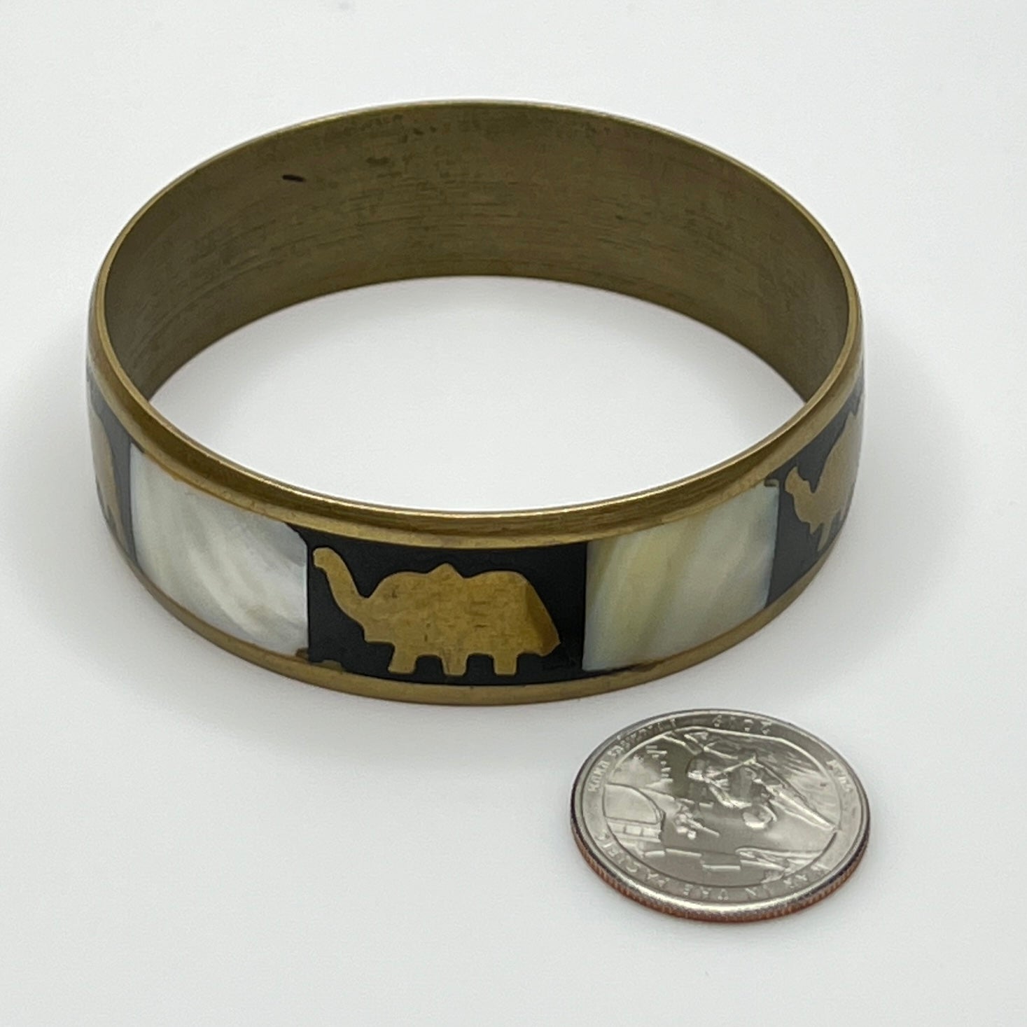Vintage brass bangle with elephant and mother of pearl inlay