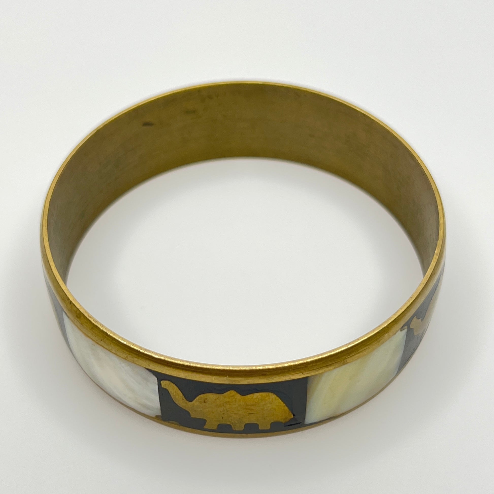Vintage brass bangle with elephant and mother of pearl inlay