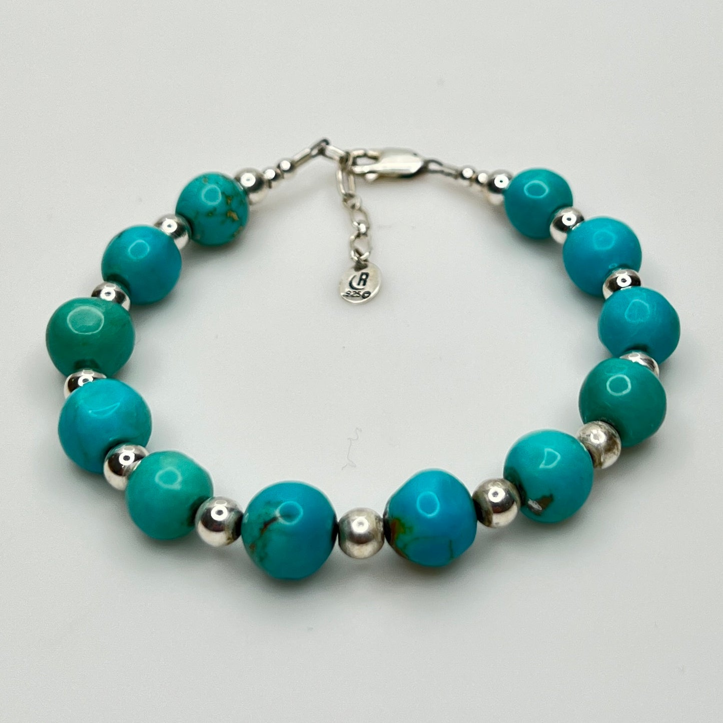 Full view of Carolyn Pollack bracelet laid flat with extender