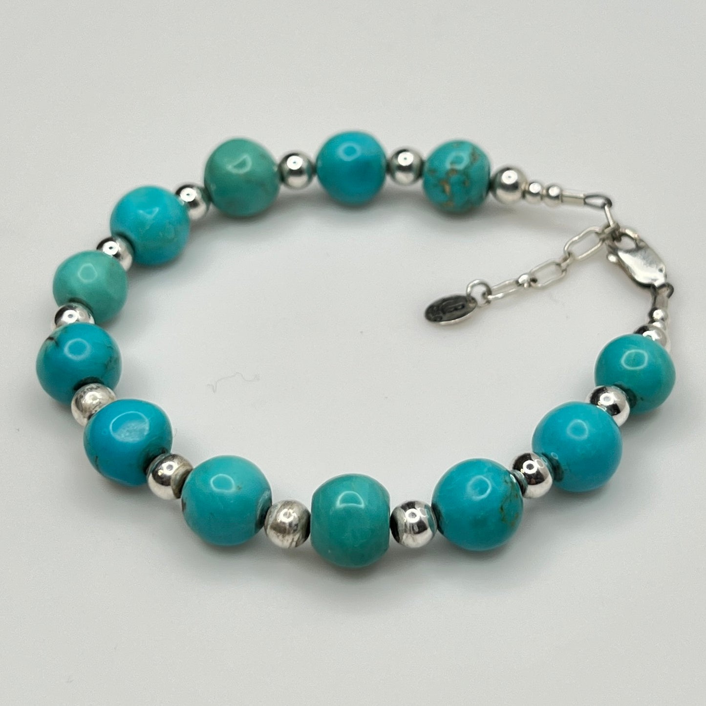 Full view of Carolyn Pollack bracelet laid flat with extender