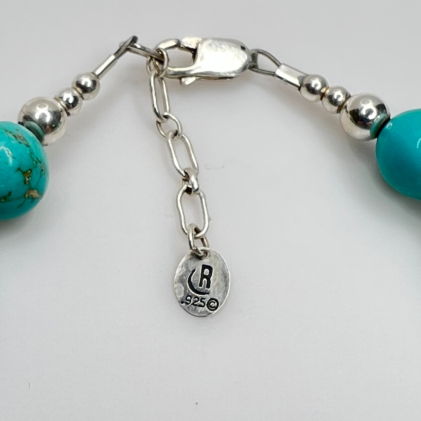 Close-up of Relios CR 925 signature hang tag