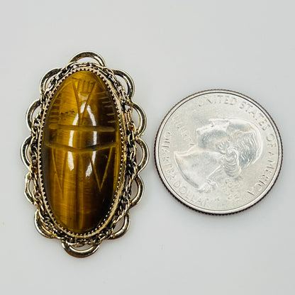 Vintage Catamore brooch with carved tiger’s eye scarab and gold-filled filigree frame
