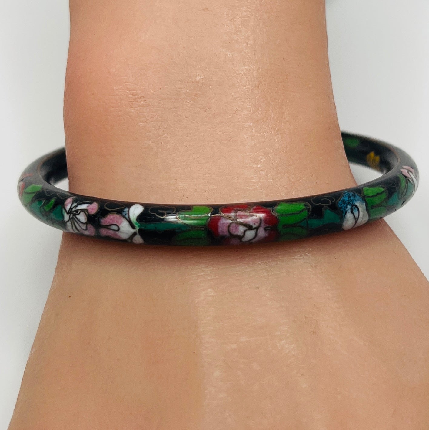 Vintage black cloisonné bangle bracelet with multicolor floral design