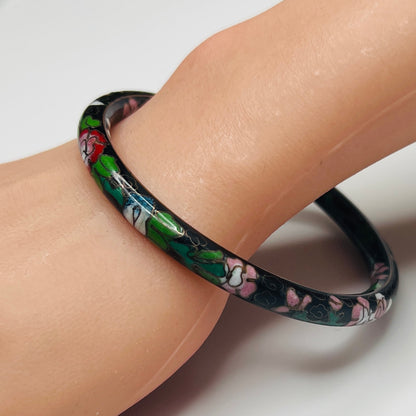 Side view of enamel floral bracelet on wrist