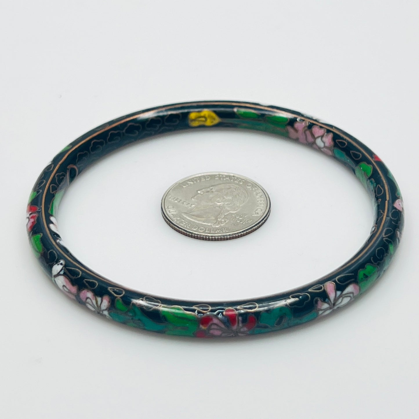 Close-up of cloisonné detail with gold wire outlines