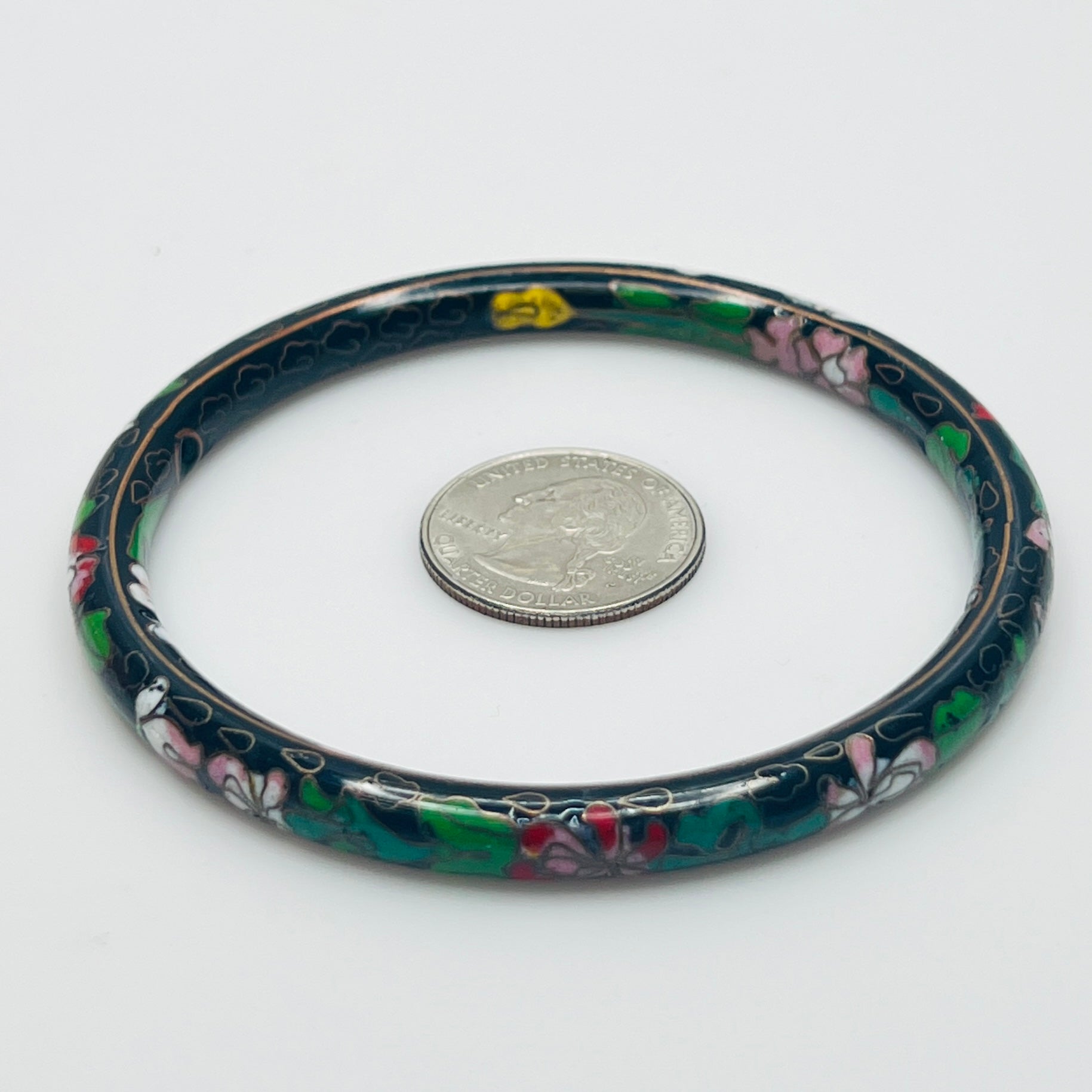 Close-up of cloisonné detail with gold wire outlines