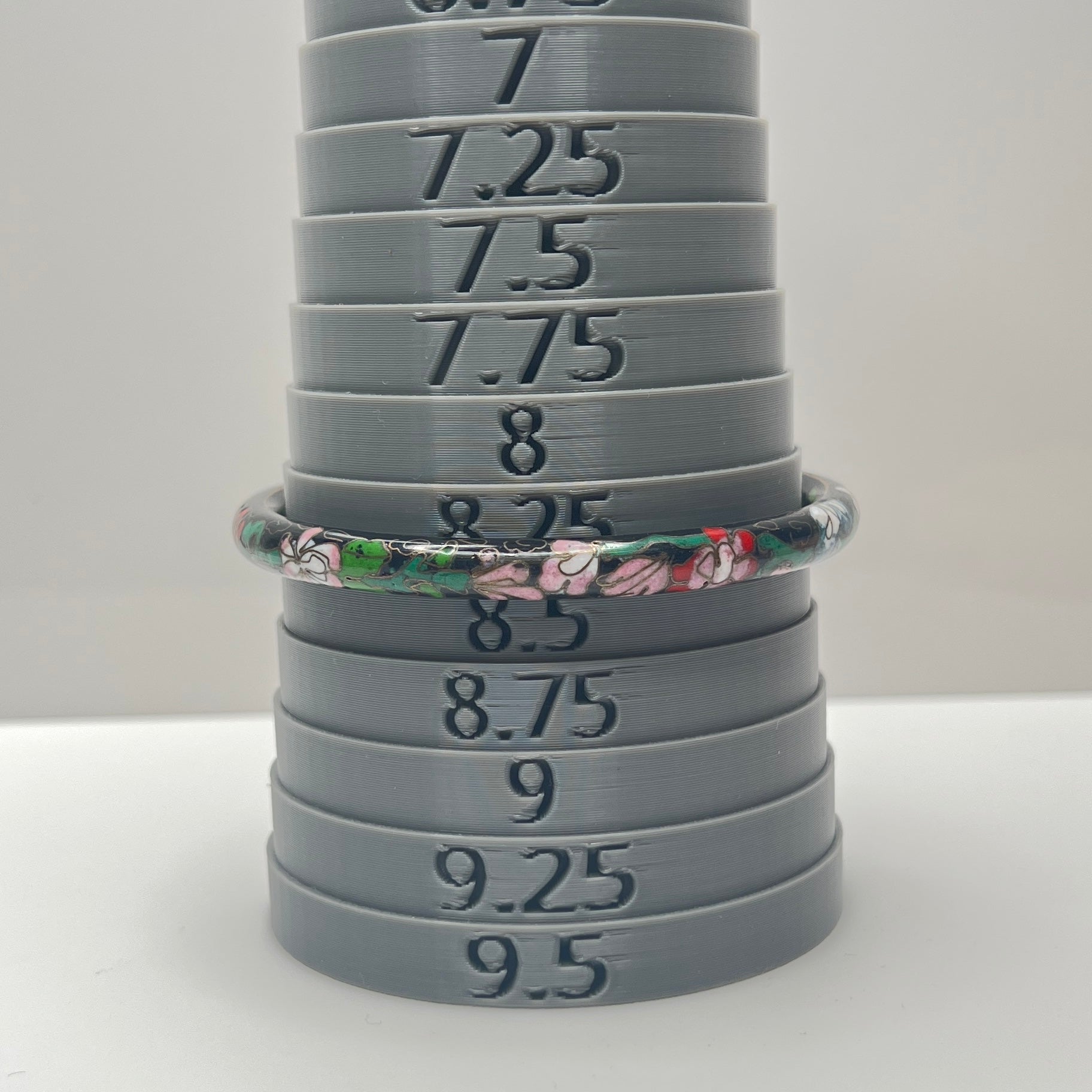 Close-up of cloisonné detail with gold wire outlines