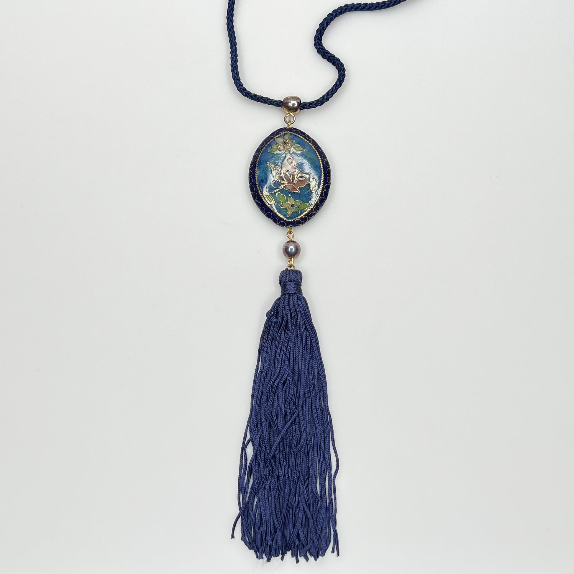Reversible cloisonné pendant necklace with navy cord and tassel