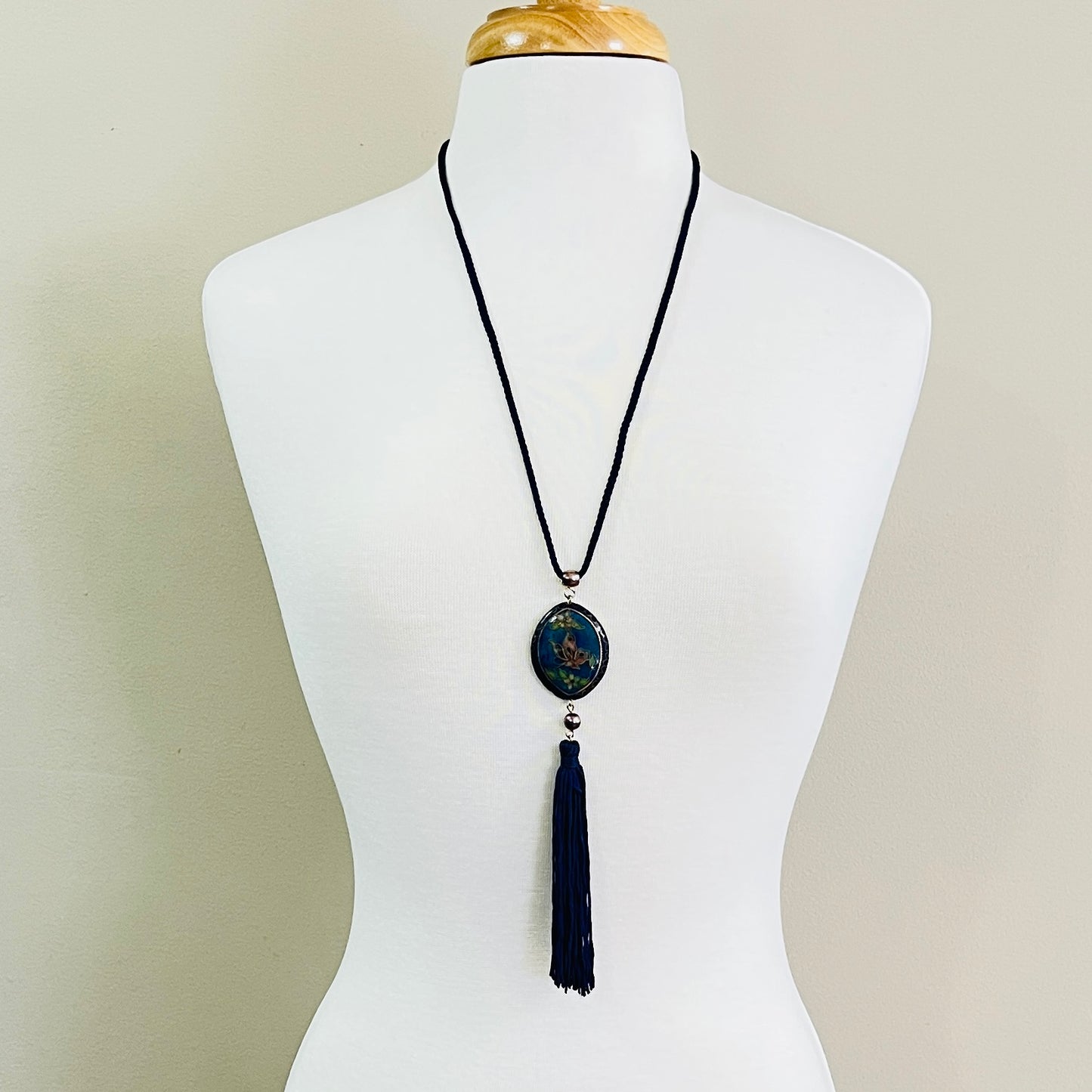 Reversible cloisonné pendant necklace with navy cord and tassel