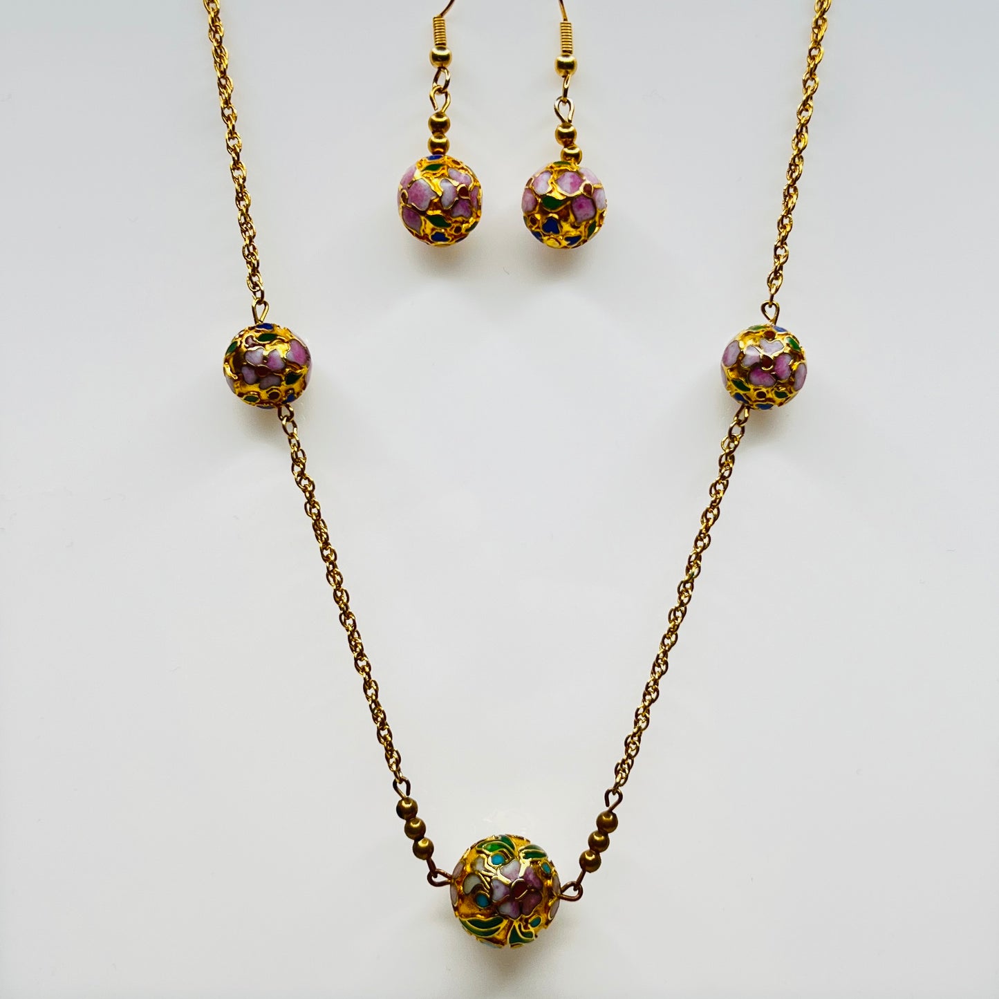 Cloisonné necklace and earring set with floral enamel beads in pink, blue, and green