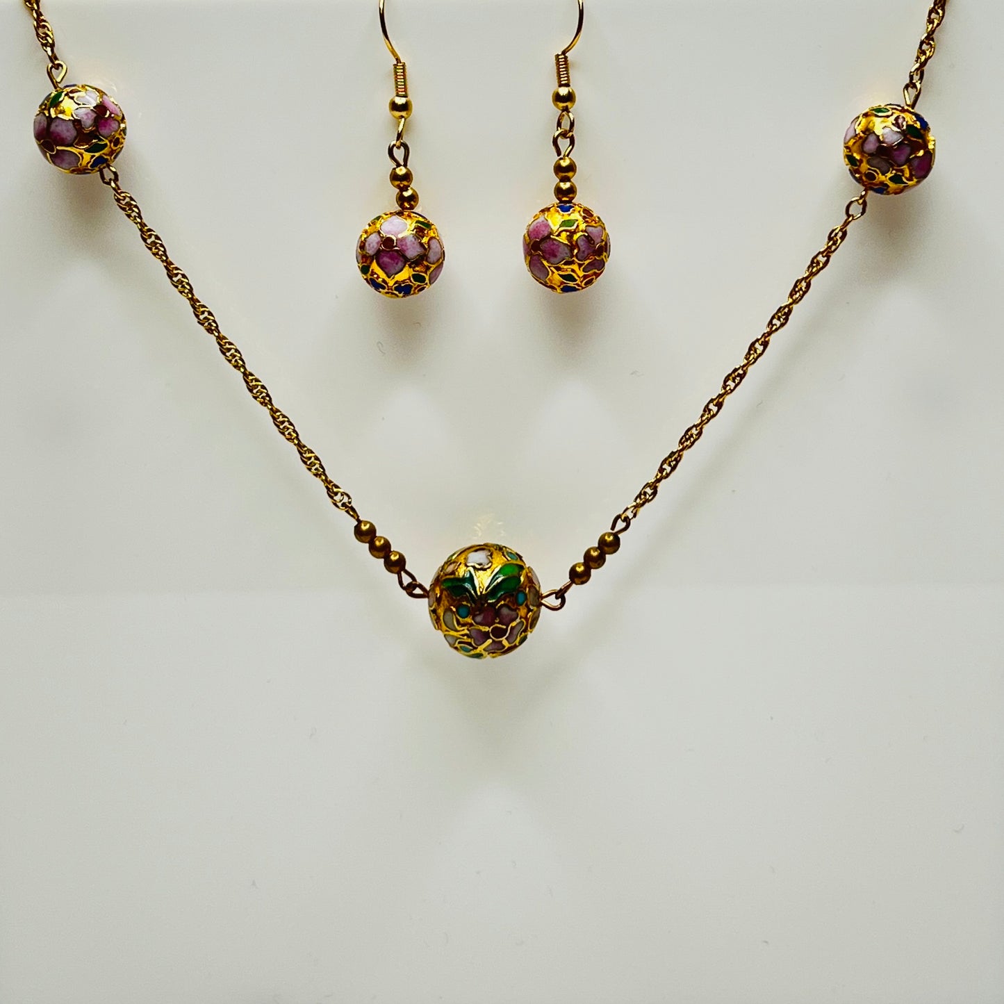 Cloisonné necklace and earring set with floral enamel beads in pink, blue, and green
