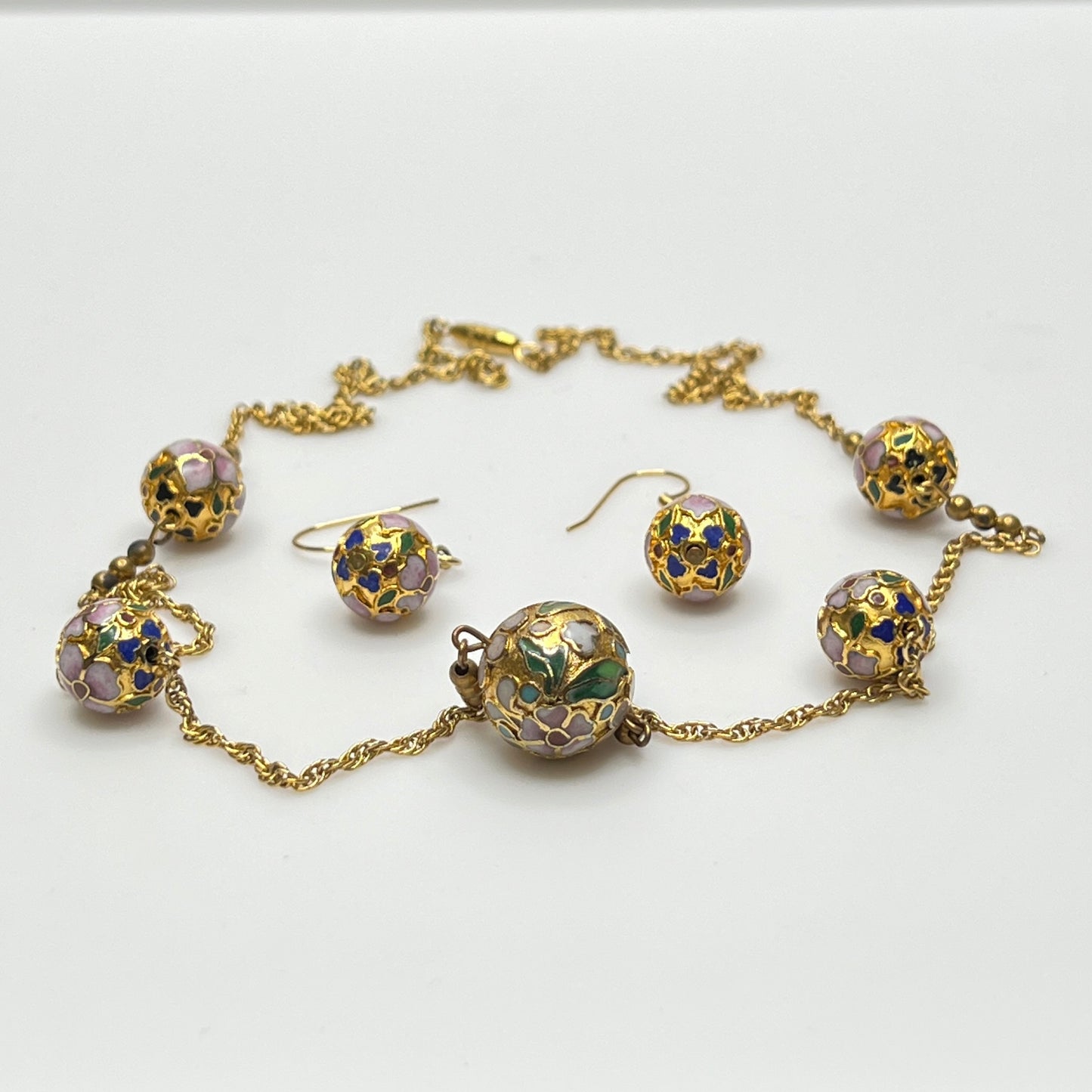 Cloisonné necklace and earring set with floral enamel beads in pink, blue, and green