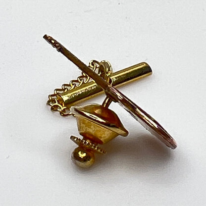 1960s copper guitar tie tack with gold tone chain and detailed fretwork