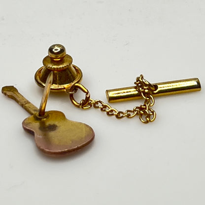 Back view showing tack clutch and gold tone safety chain