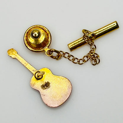 Back view showing tack clutch and gold tone safety chain