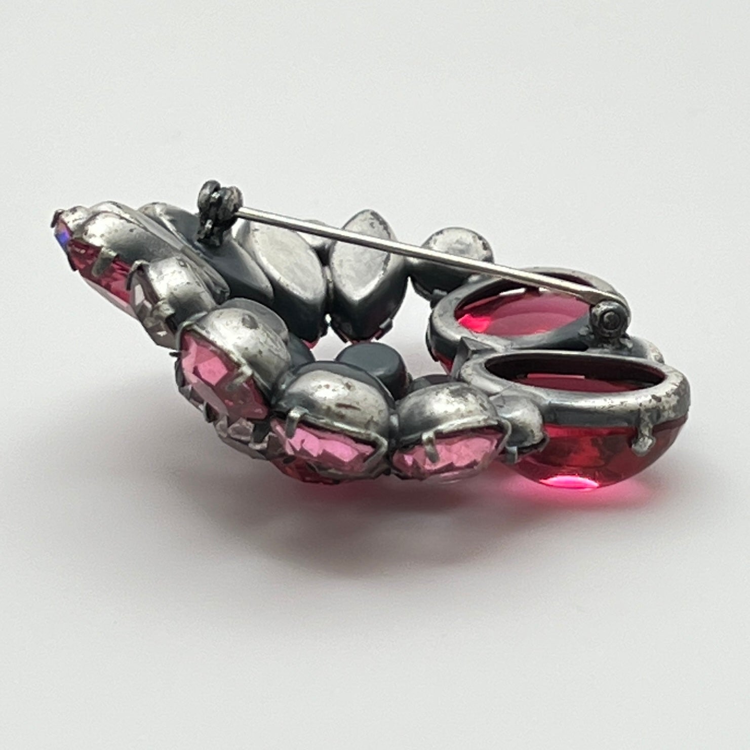 1960s pink glass rhinestone brooch with matching aurora borealis earrings