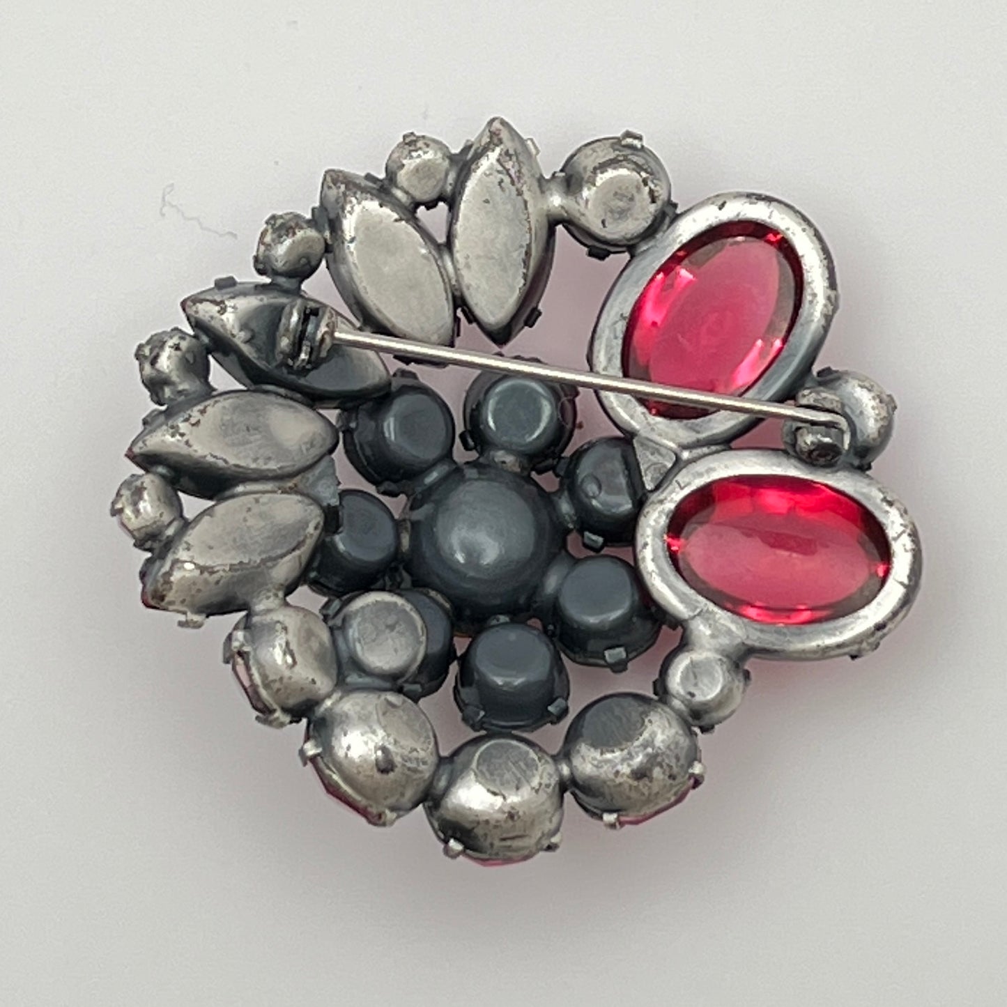 1960s pink glass rhinestone brooch with matching aurora borealis earrings