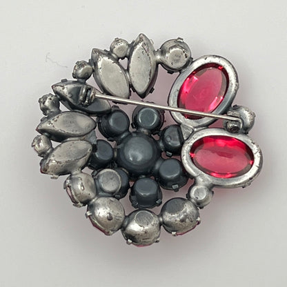 1960s pink glass rhinestone brooch with matching aurora borealis earrings