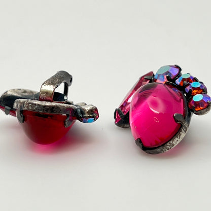 Close-up of signed Coro earrings with prong-set rhinestones