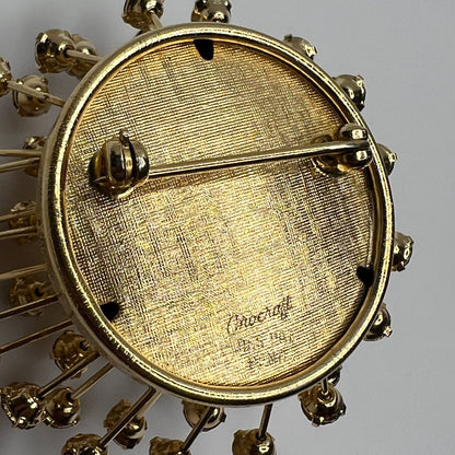 Close-up of signed back of vintage Corocraft Sputnik brooch