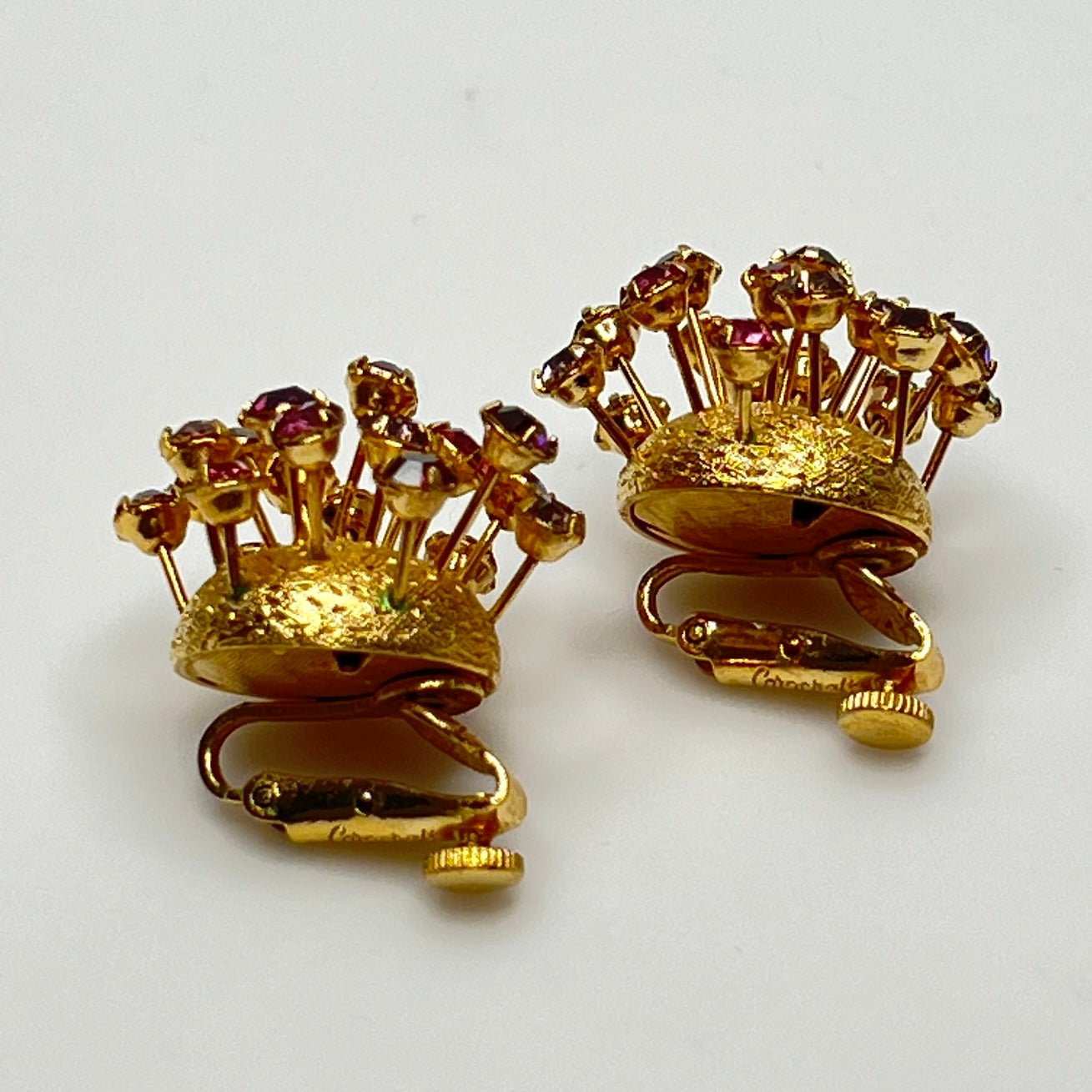 Corocraft screw-clip earring backs with rhinestone burst design