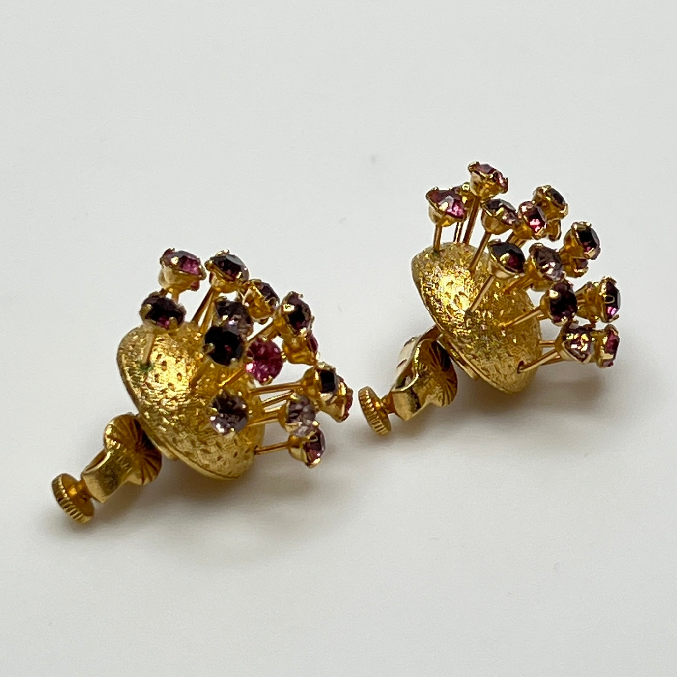 Corocraft screw-clip earring backs with rhinestone burst design