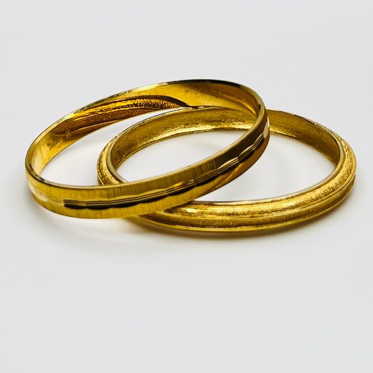 Crown Trifari gold tone etched bangle set 1970s