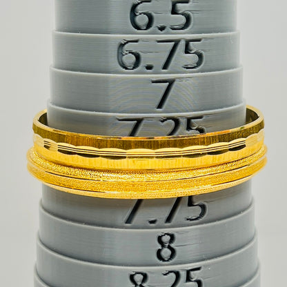Crown Trifari gold tone etched bangle set 1970s
